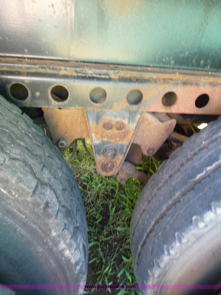 image for item L5810 2002 AMC flatbed trailer