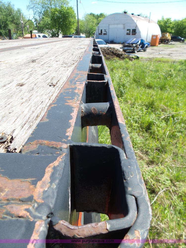 image for item L5810 2002 AMC flatbed trailer