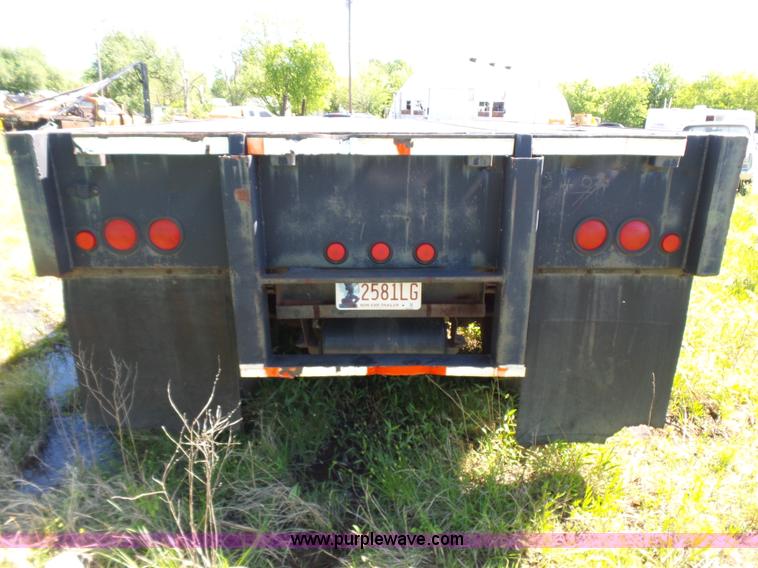 image for item L5810 2002 AMC flatbed trailer