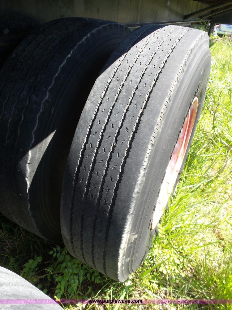 image for item L5810 2002 AMC flatbed trailer