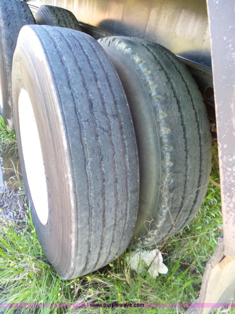 image for item L5810 2002 AMC flatbed trailer