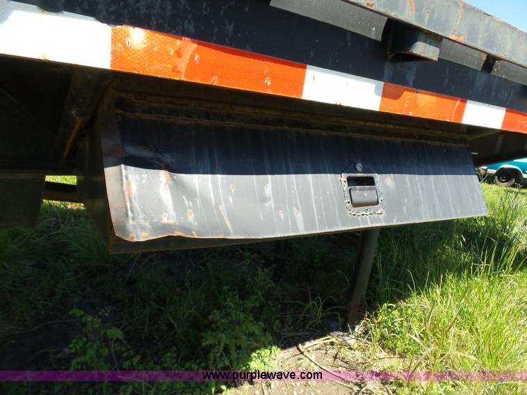 image for item L5810 2002 AMC flatbed trailer