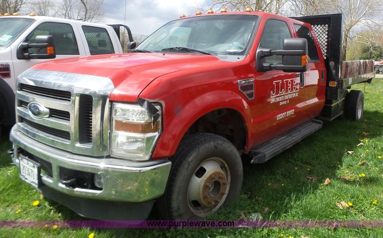 image for item L7224 2008 Ford F350 Super Duty Crew Cab flatbed pickup truck