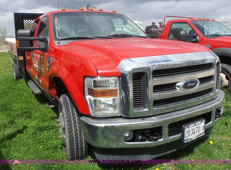 image for item L7224 2008 Ford F350 Super Duty Crew Cab flatbed pickup truck