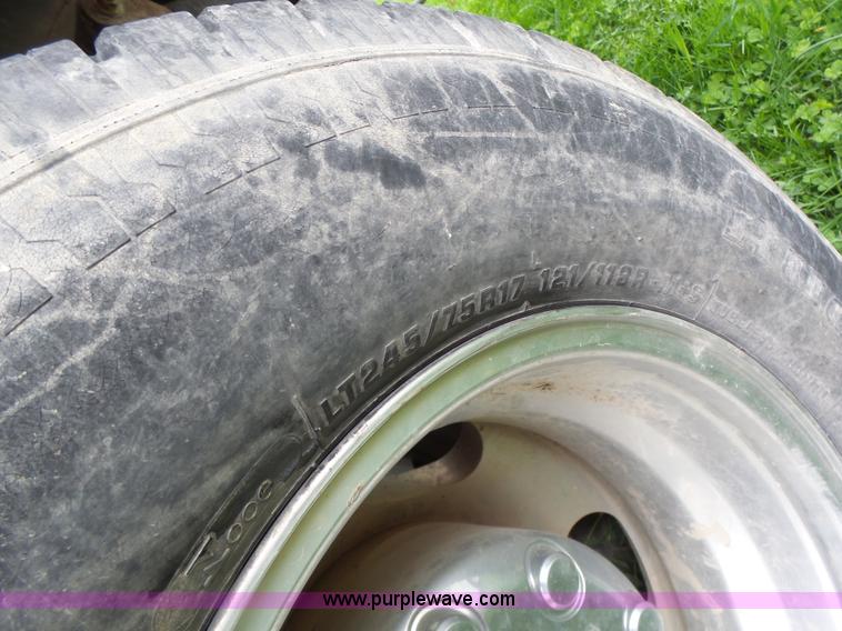 image for item L7224 2008 Ford F350 Super Duty Crew Cab flatbed pickup truck