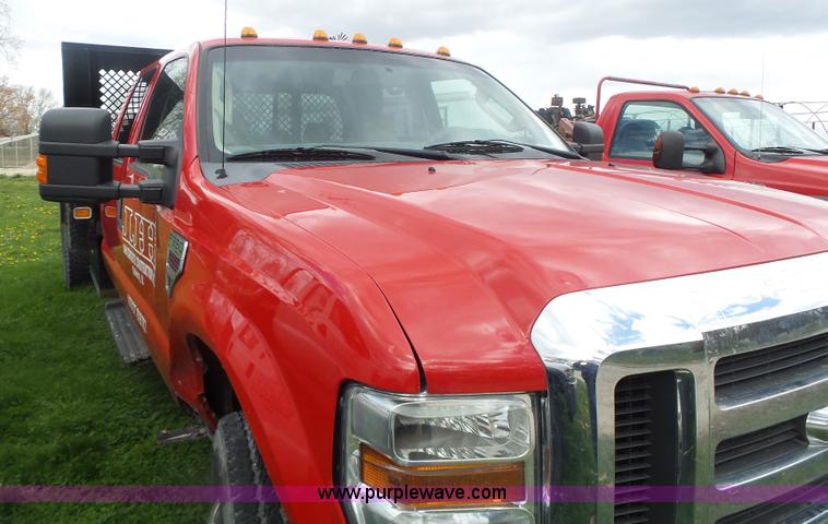 image for item L7224 2008 Ford F350 Super Duty Crew Cab flatbed pickup truck