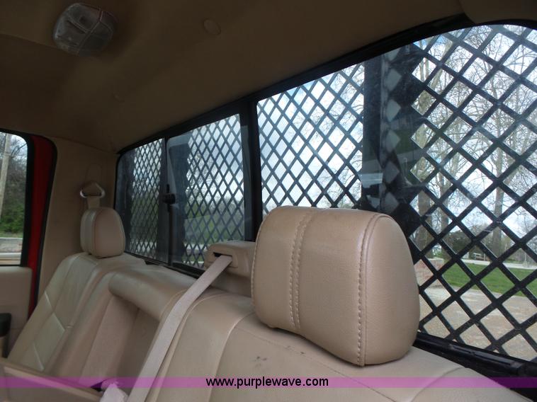 image for item L7224 2008 Ford F350 Super Duty Crew Cab flatbed pickup truck