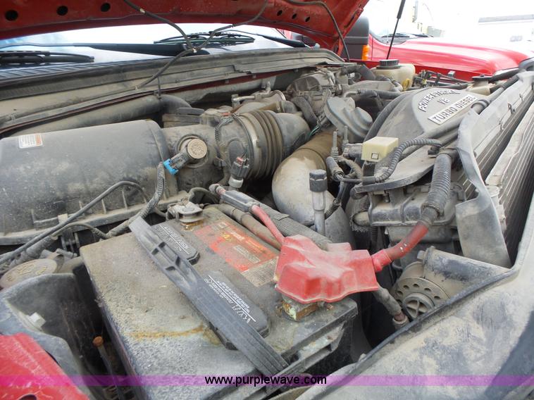 image for item L7224 2008 Ford F350 Super Duty Crew Cab flatbed pickup truck