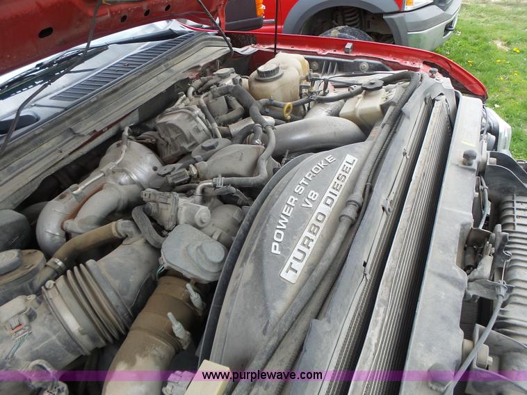 image for item L7224 2008 Ford F350 Super Duty Crew Cab flatbed pickup truck