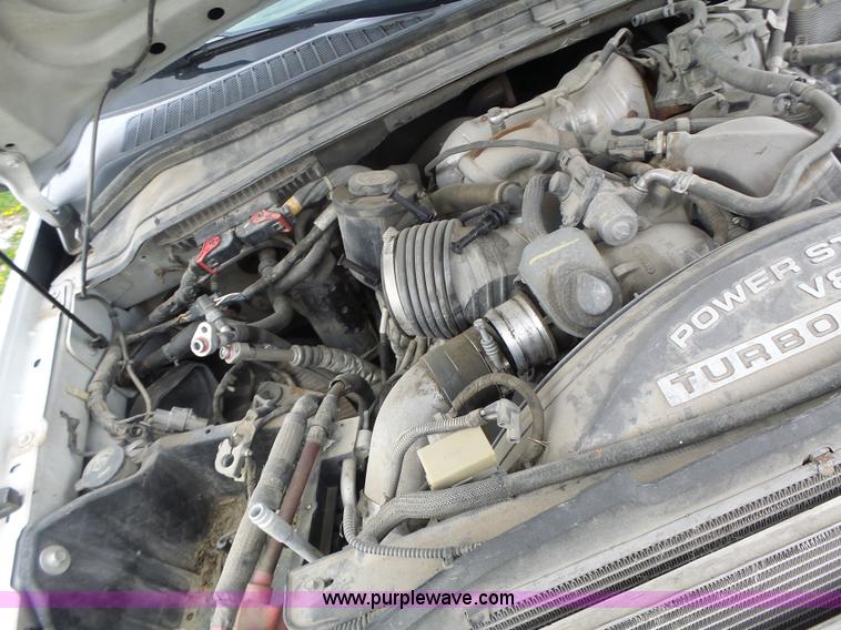 image for item L7225 2008 Ford F450 Super Duty Crew Cab flatbed truck