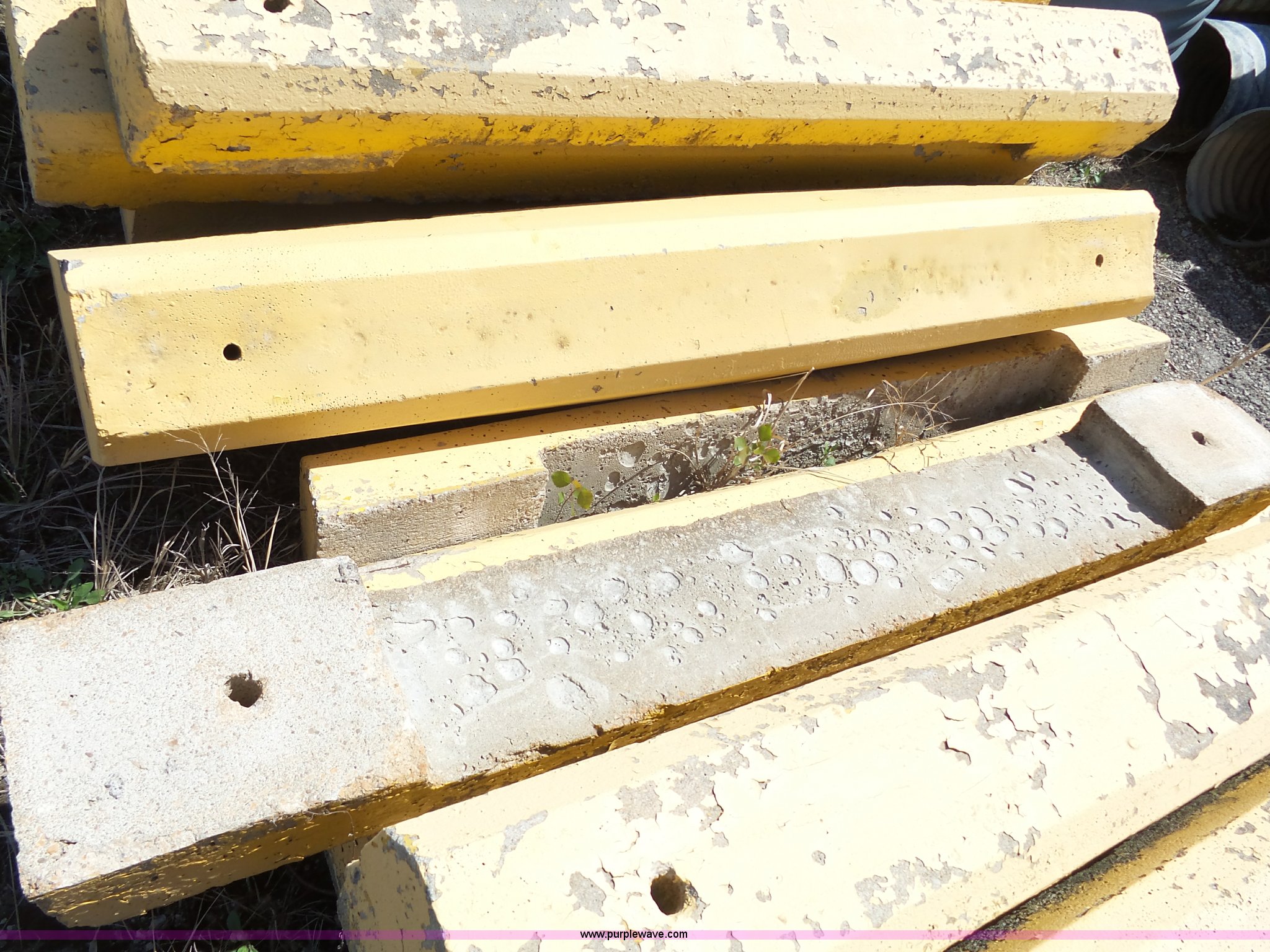 (100) concrete parking blocks in Topeka, KS | Item AM9647 sold | Purple