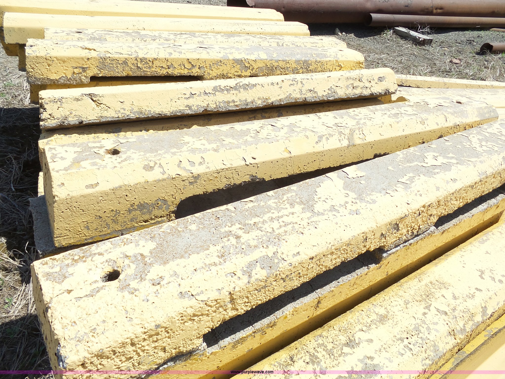 (100) concrete parking blocks in Topeka, KS Item AM9647 sold Purple