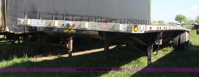 image for item L5804 1999 Utility FS2CHA flatbed trailer