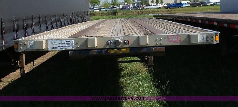 image for item L5804 1999 Utility FS2CHA flatbed trailer
