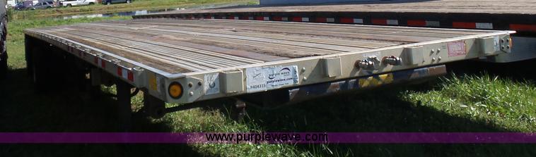 image for item L5804 1999 Utility FS2CHA flatbed trailer