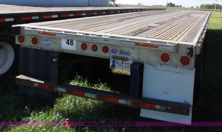 image for item L5804 1999 Utility FS2CHA flatbed trailer