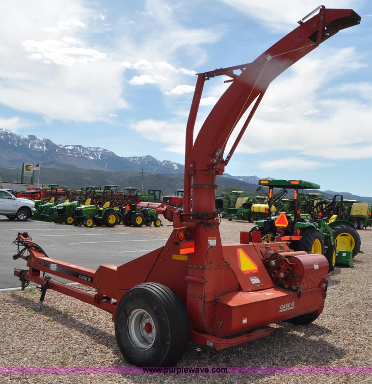 image for item G7370 2005 Case IH FHX300 forage harvester and silage trailer