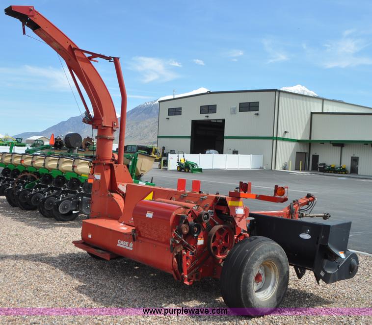 image for item G7370 2005 Case IH FHX300 forage harvester and silage trailer