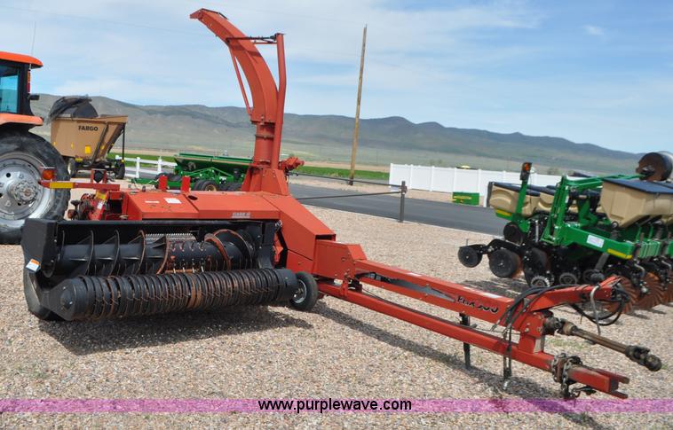 image for item G7370 2005 Case IH FHX300 forage harvester and silage trailer