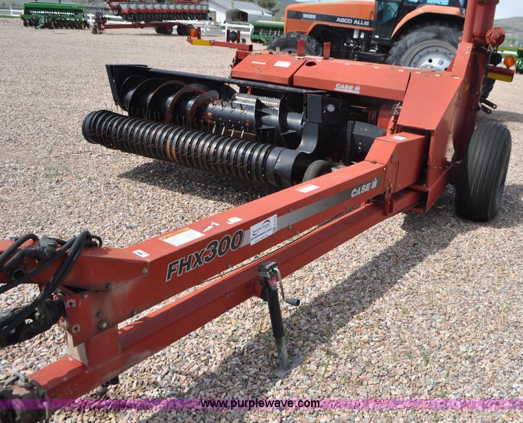 image for item G7370 2005 Case IH FHX300 forage harvester and silage trailer