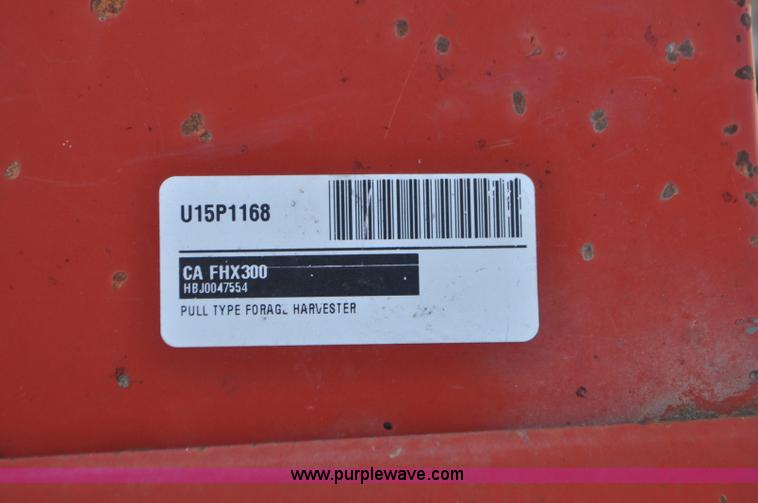 image for item G7370 2005 Case IH FHX300 forage harvester and silage trailer