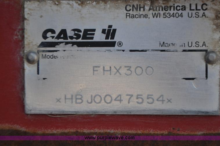 image for item G7370 2005 Case IH FHX300 forage harvester and silage trailer