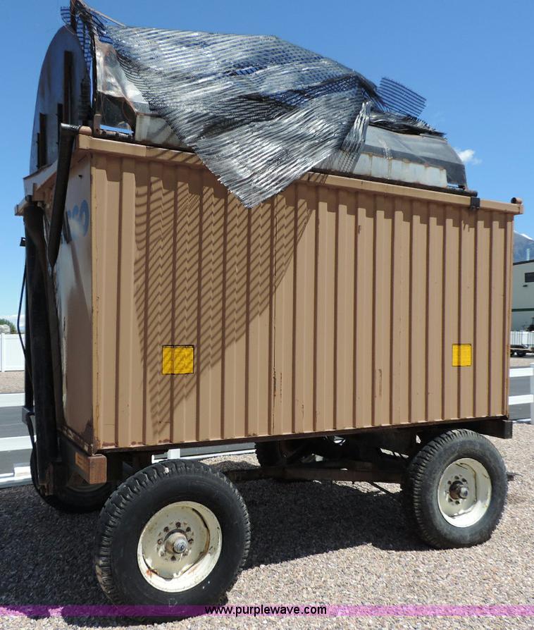 image for item G7370 2005 Case IH FHX300 forage harvester and silage trailer