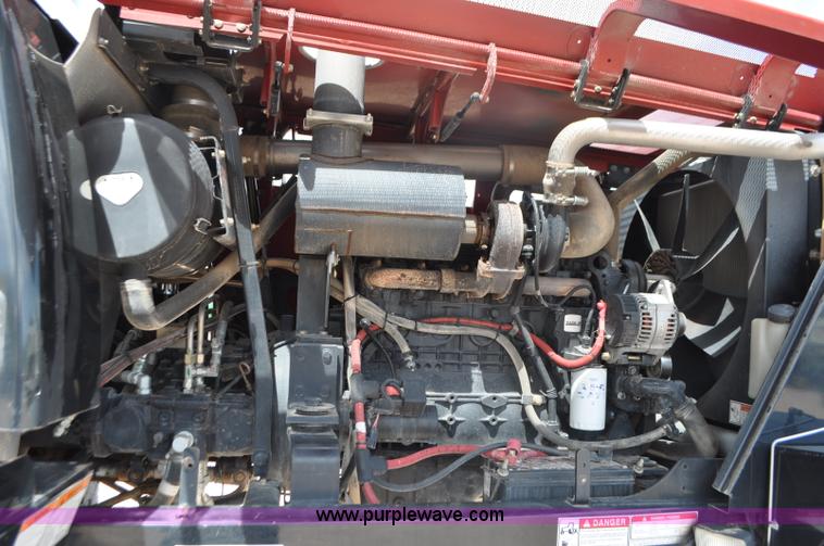 image for item G7377 2009 Case IH 1903WD self-propelled windrower