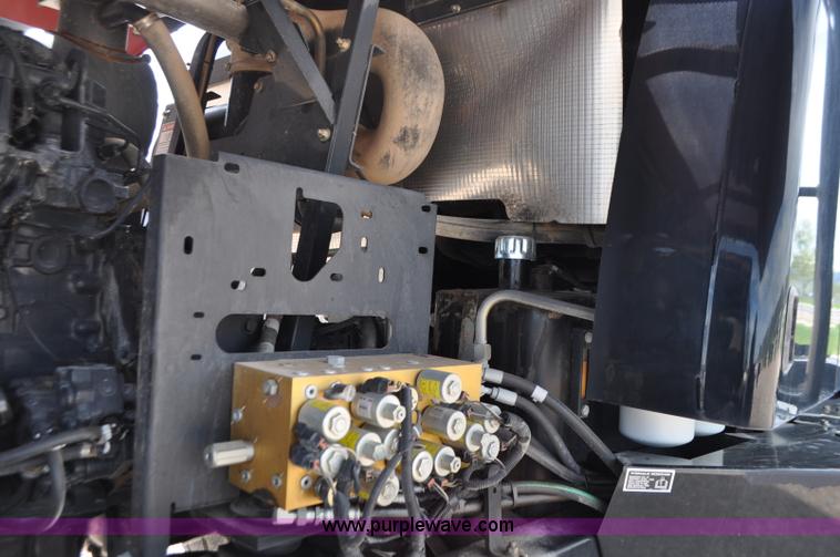 image for item G7377 2009 Case IH 1903WD self-propelled windrower