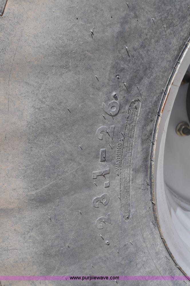 image for item G7377 2009 Case IH 1903WD self-propelled windrower