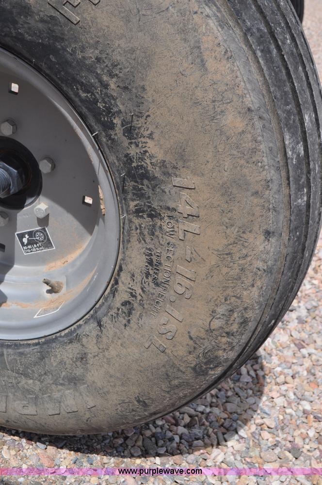 image for item G7377 2009 Case IH 1903WD self-propelled windrower