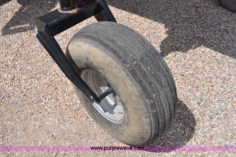 image for item G7377 2009 Case IH 1903WD self-propelled windrower