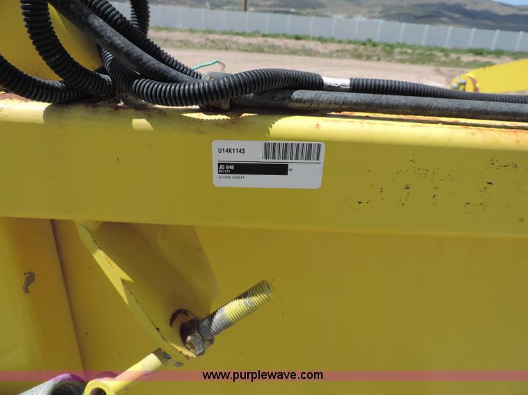 image for item G7399 2003 John Deere 640A pickup head