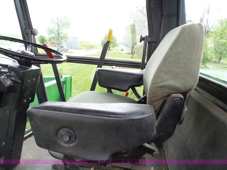 image for item J4977 1993 John Deere 3830 self-propelled windrower