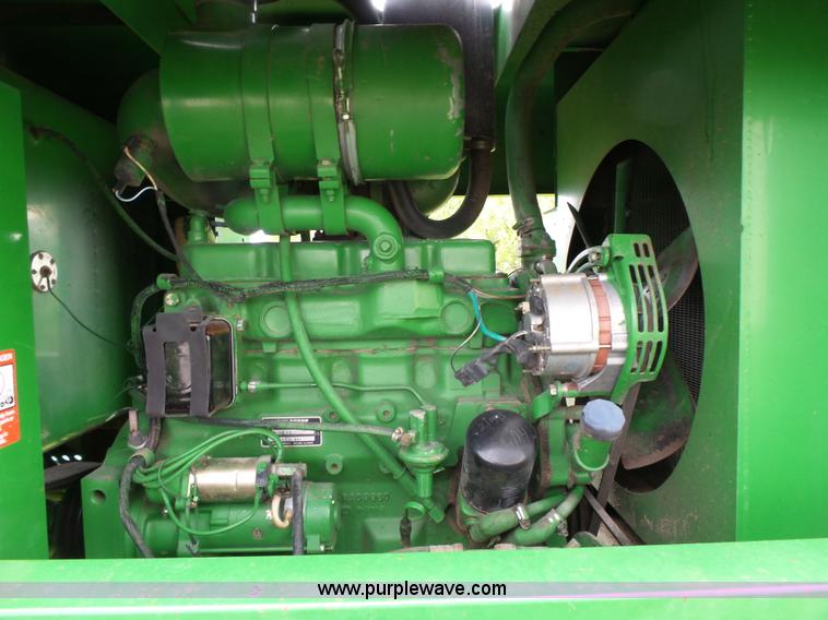 image for item J4977 1993 John Deere 3830 self-propelled windrower
