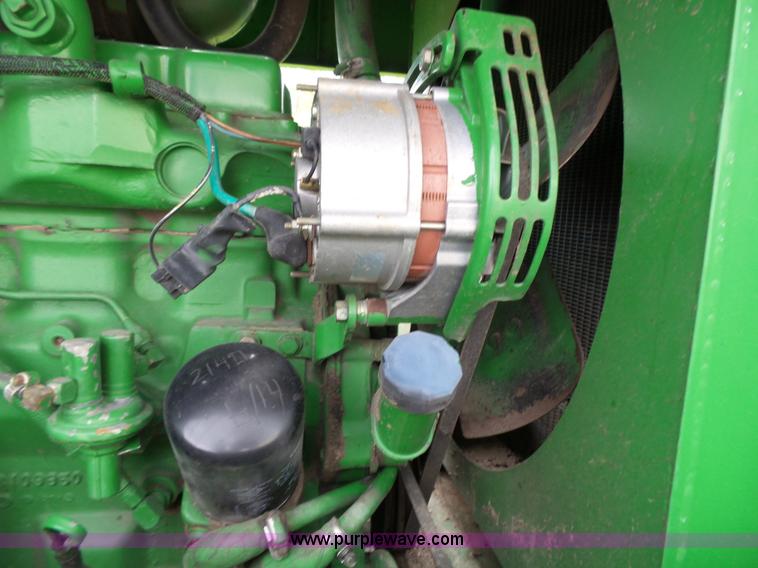 image for item J4977 1993 John Deere 3830 self-propelled windrower