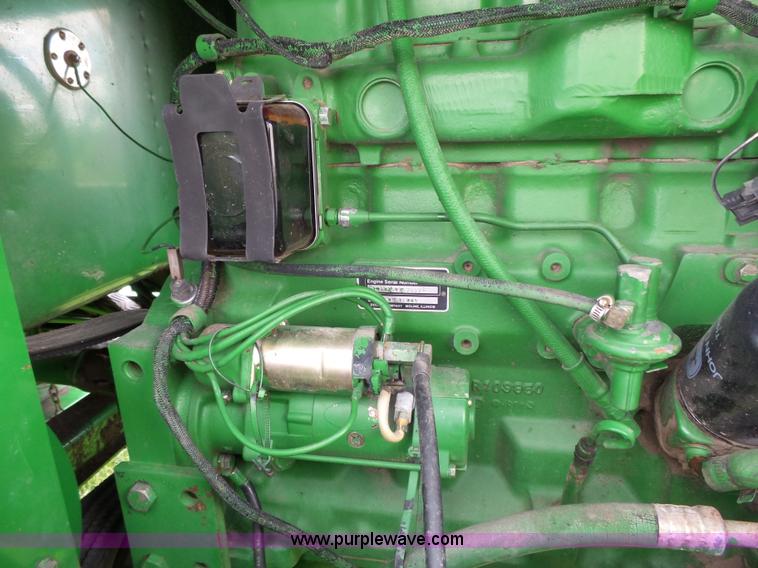 image for item J4977 1993 John Deere 3830 self-propelled windrower