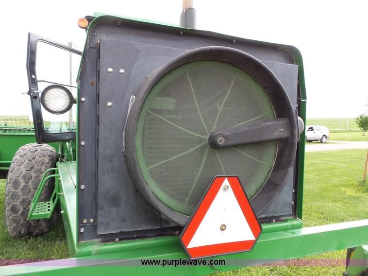 image for item J4977 1993 John Deere 3830 self-propelled windrower