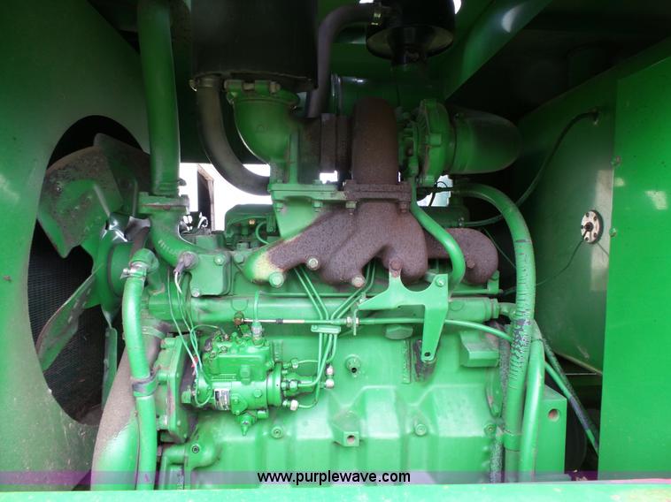 image for item J4977 1993 John Deere 3830 self-propelled windrower