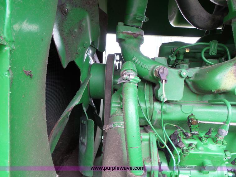 image for item J4977 1993 John Deere 3830 self-propelled windrower