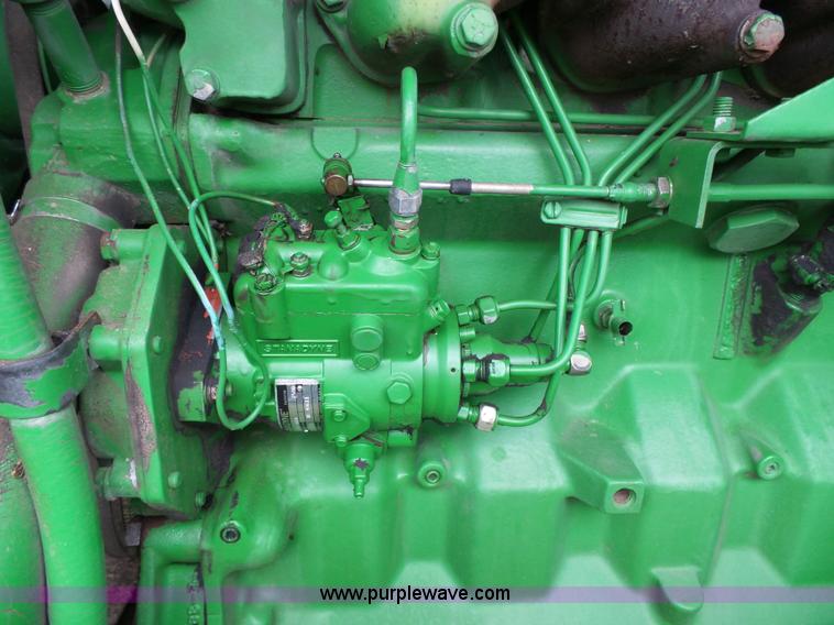 image for item J4977 1993 John Deere 3830 self-propelled windrower