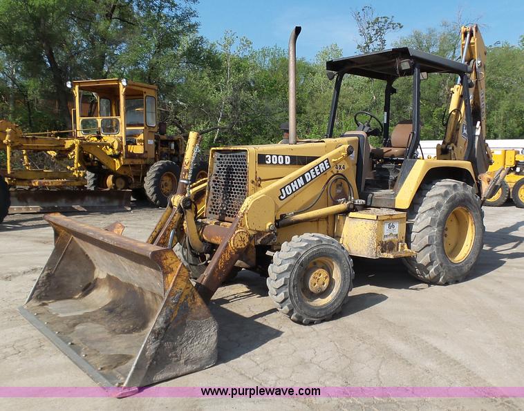 image for item K1378 John Deere 300D backhoe