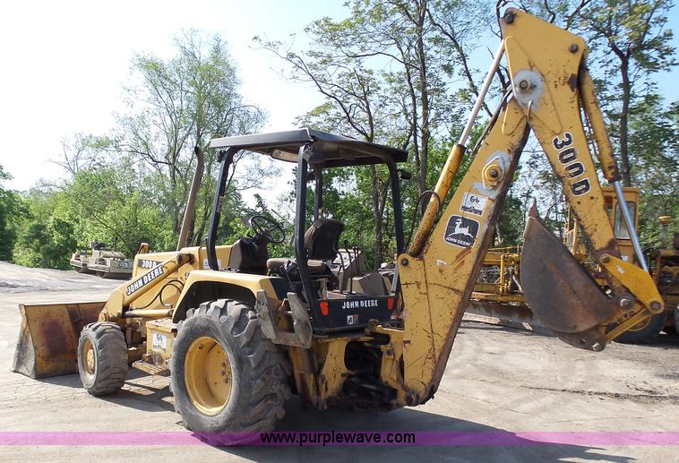 image for item K1378 John Deere 300D backhoe