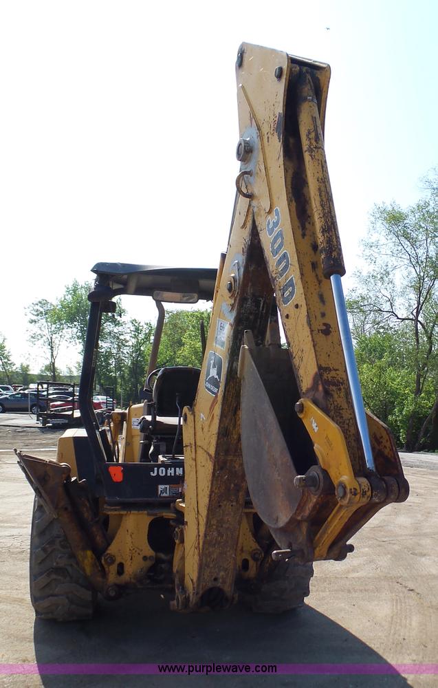 image for item K1378 John Deere 300D backhoe