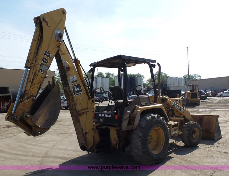 image for item K1378 John Deere 300D backhoe