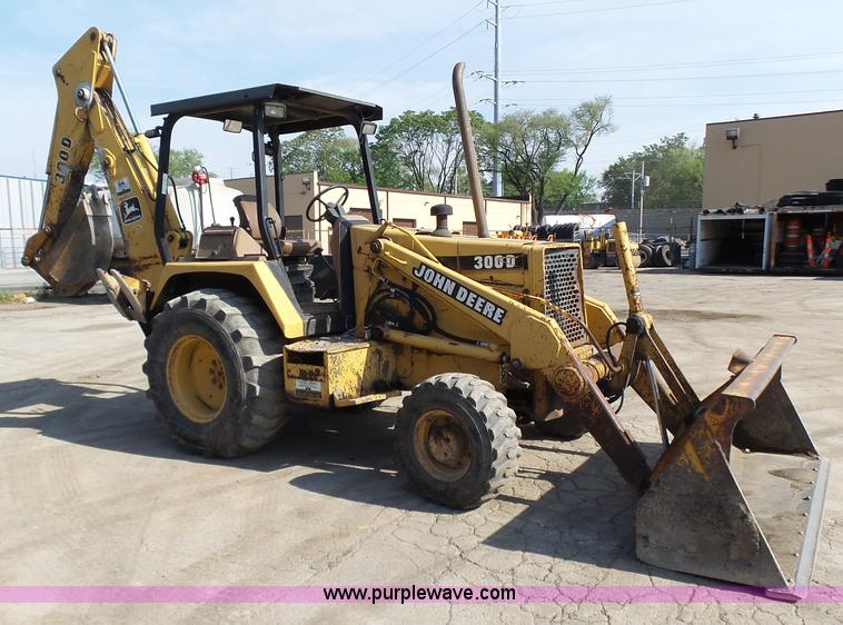 image for item K1378 John Deere 300D backhoe