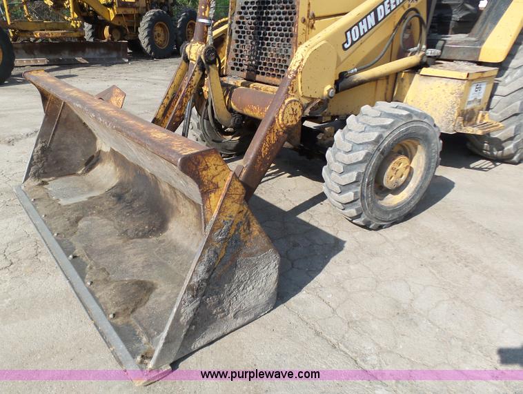 image for item K1378 John Deere 300D backhoe