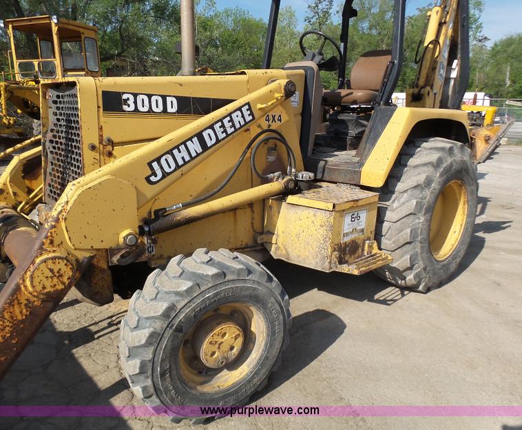 image for item K1378 John Deere 300D backhoe