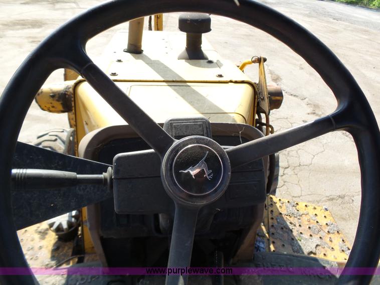 image for item K1378 John Deere 300D backhoe