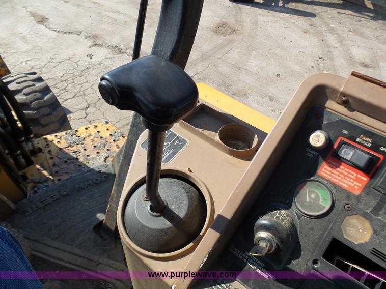 image for item K1378 John Deere 300D backhoe